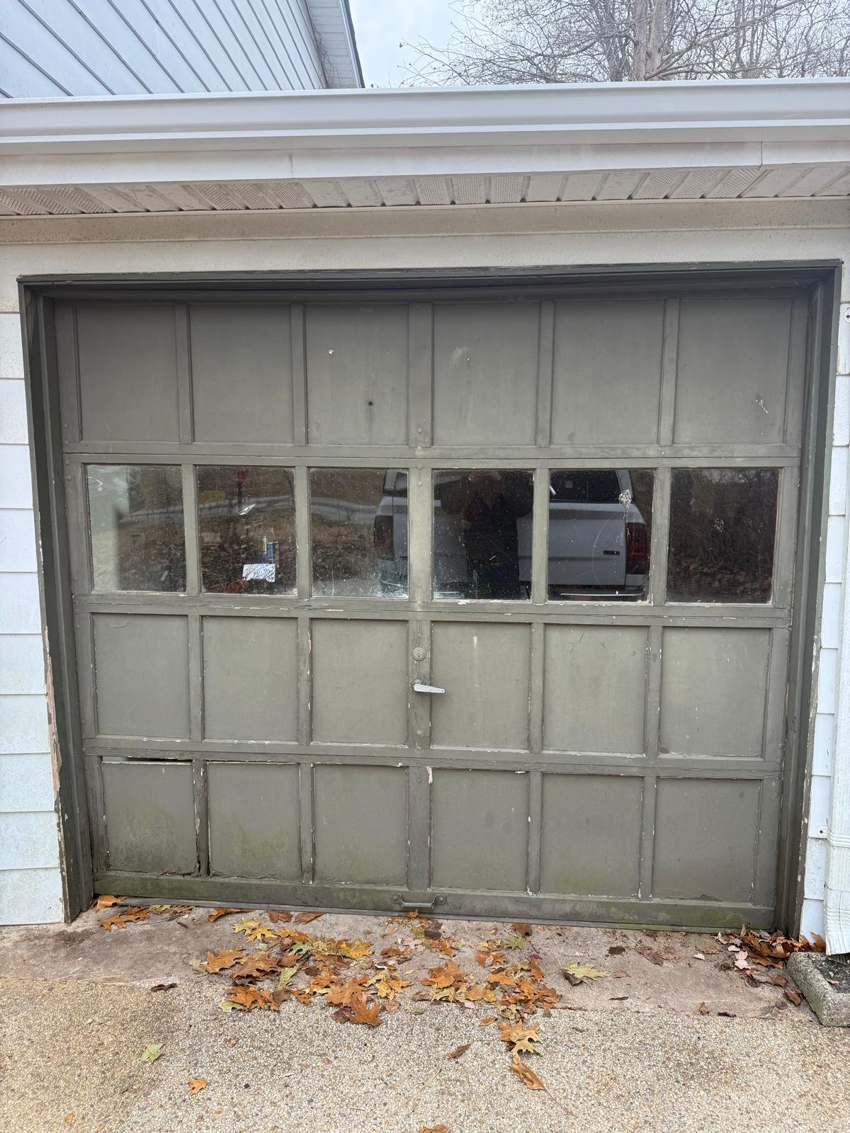 Garage door before repair